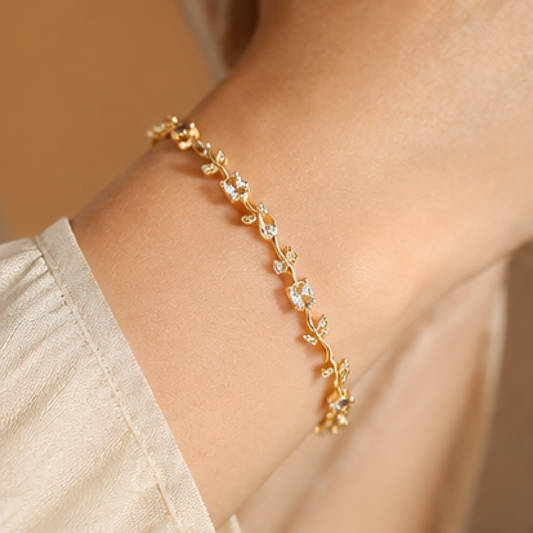Gold plated stainless steel tulip bracelet with silver CZ stones