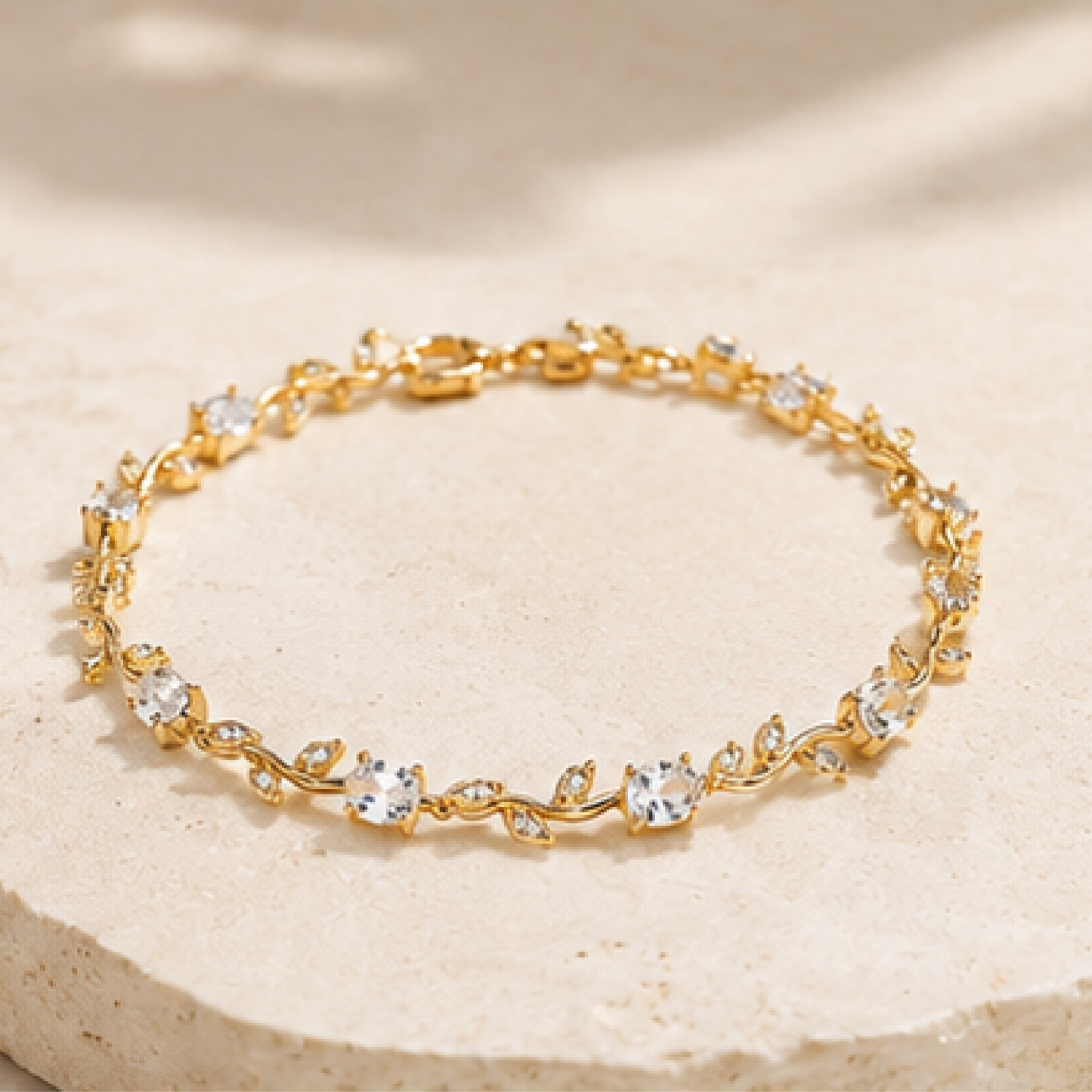 Gold plated stainless steel tulip bracelet with silver CZ stones