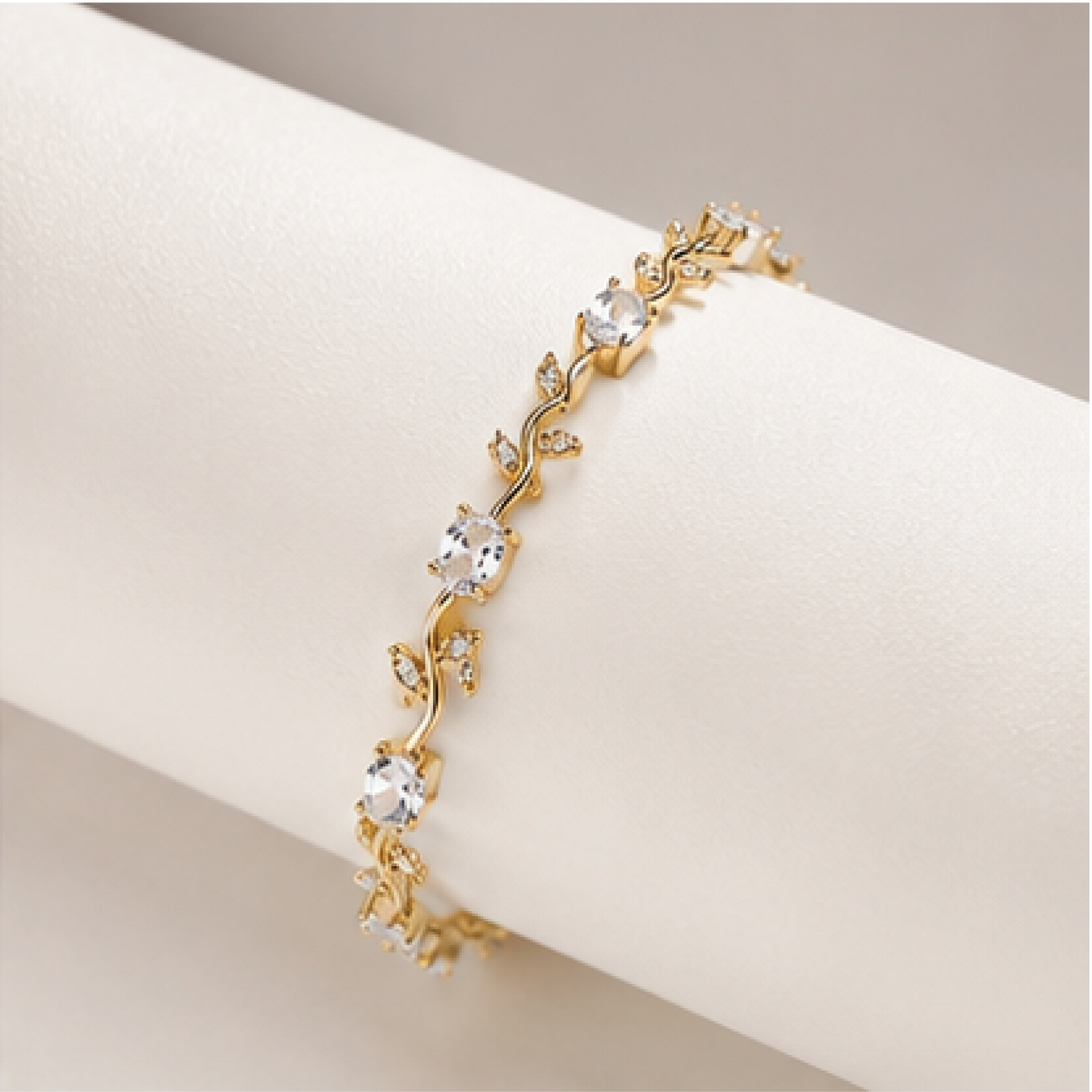 Gold plated stainless steel tulip bracelet with silver CZ stones