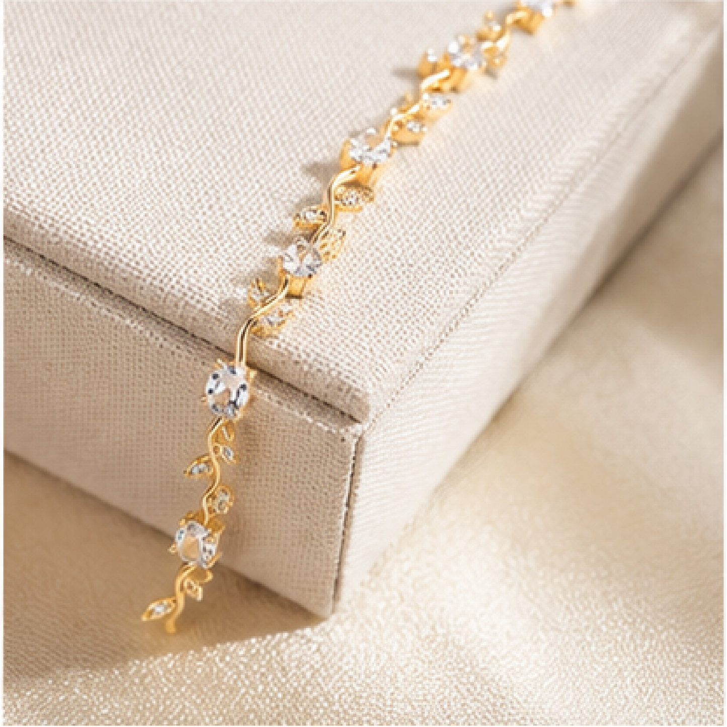 Gold plated stainless steel tulip bracelet with silver CZ stones