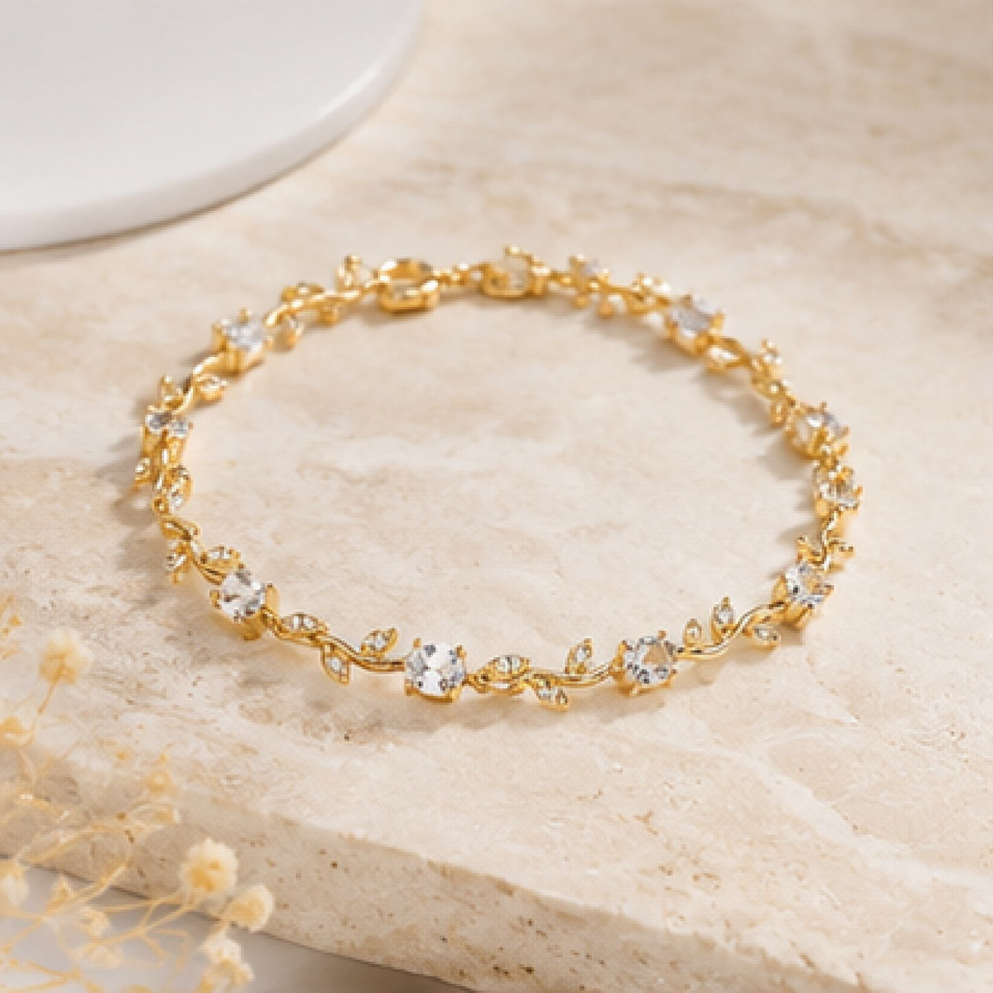 Gold plated stainless steel tulip bracelet with silver CZ stones