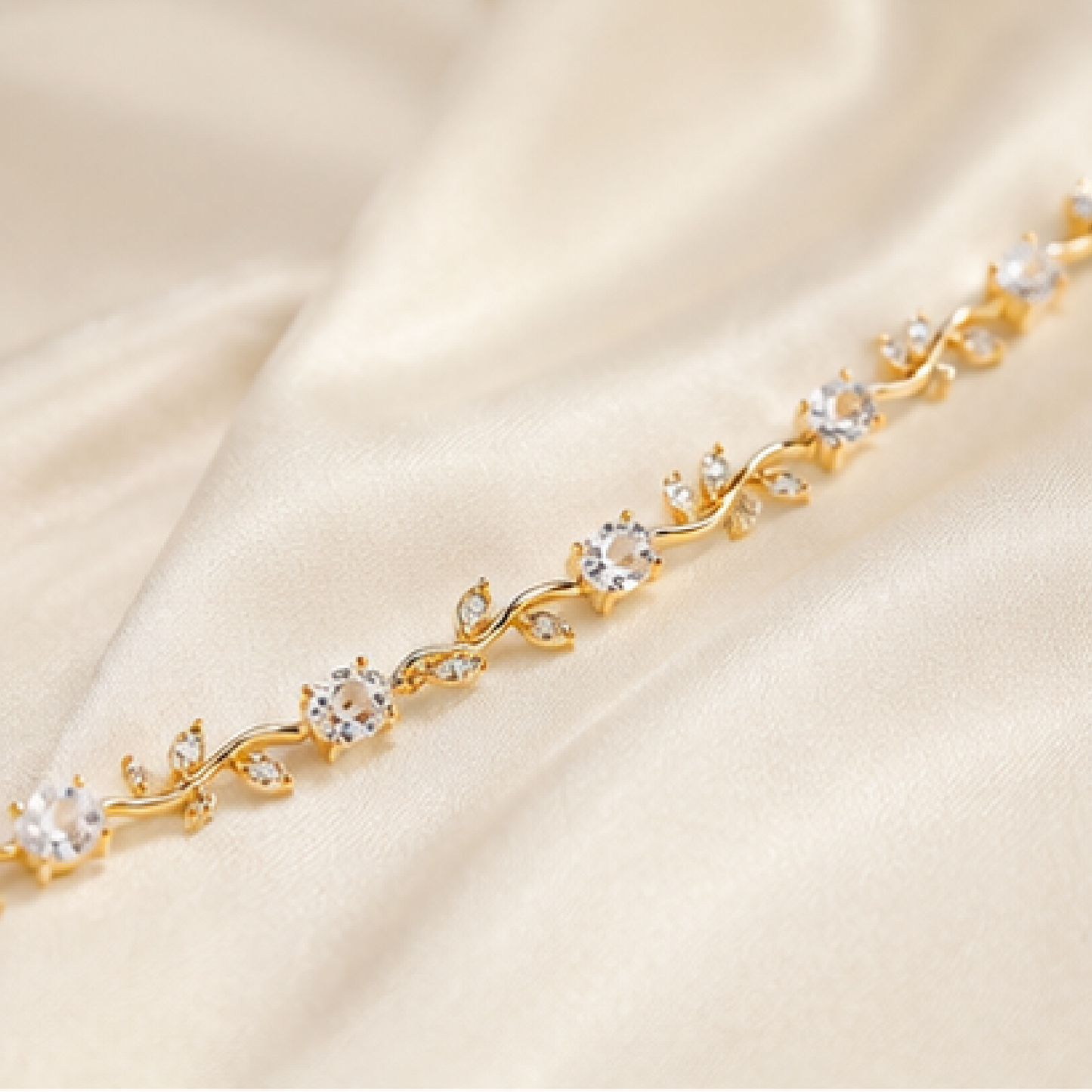 Gold plated stainless steel tulip bracelet with silver CZ stones